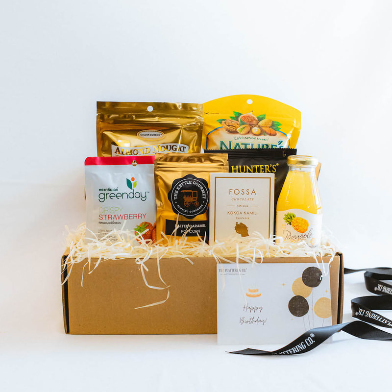 snack gift box with greenday fruit chips, golden bonbon nougat, nature's wonders fruit and nuts fusion, the kettle gourmet popcorn, fossa chocolate, hunter's chips 